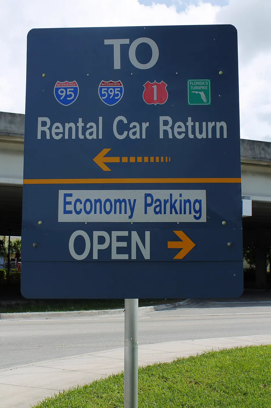 A rental car return directional sign at Fort Lauderdale airport